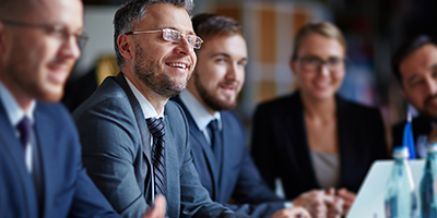 Engaged businesspeople in a workshop