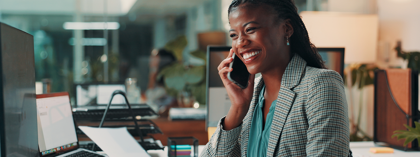 A young woman talking on the phone