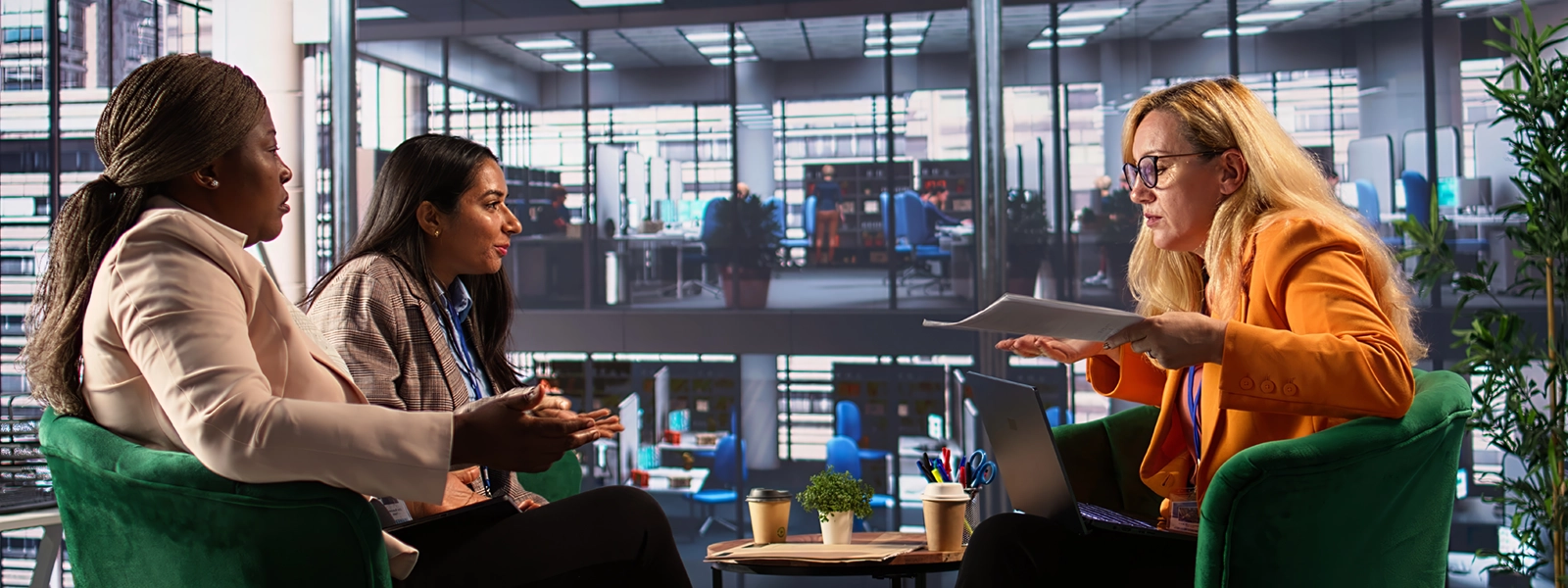 a photo of three women talking in a business setting. one of them is obviously irritated