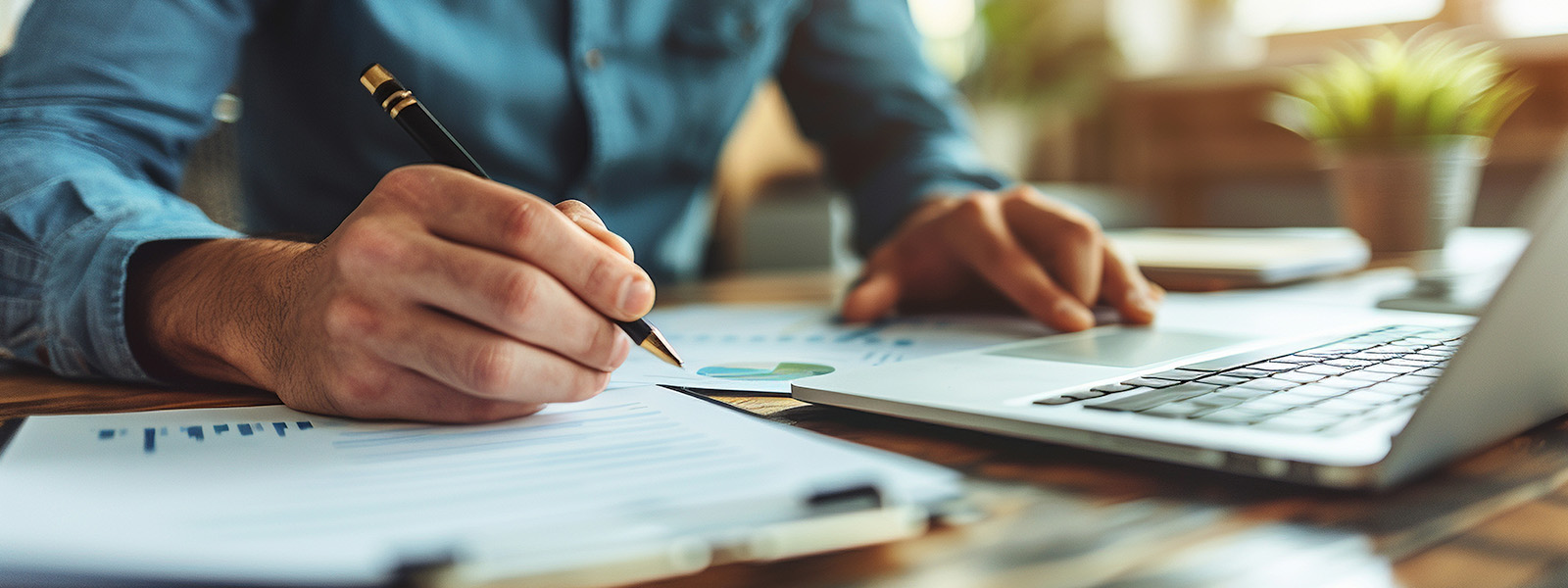 A close up photo of someone going over papers