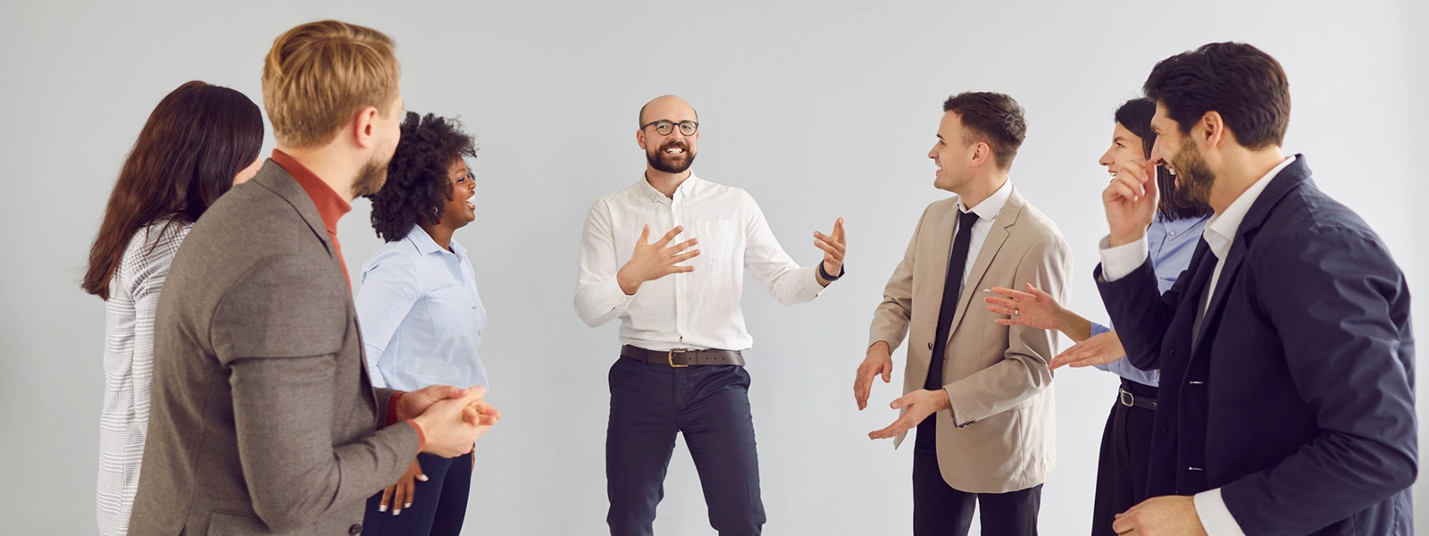 a photo of an animated man telling a story to a group of people